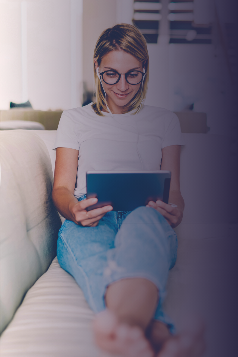 Individual working on a laptop in a peaceful, curated home office